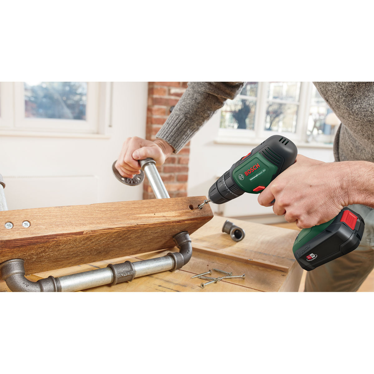 Bosch  Akku-Schlagbohrschrauber UniversalImpact 18V 2 Akkus Ladegerät und Zubehör Bild 3